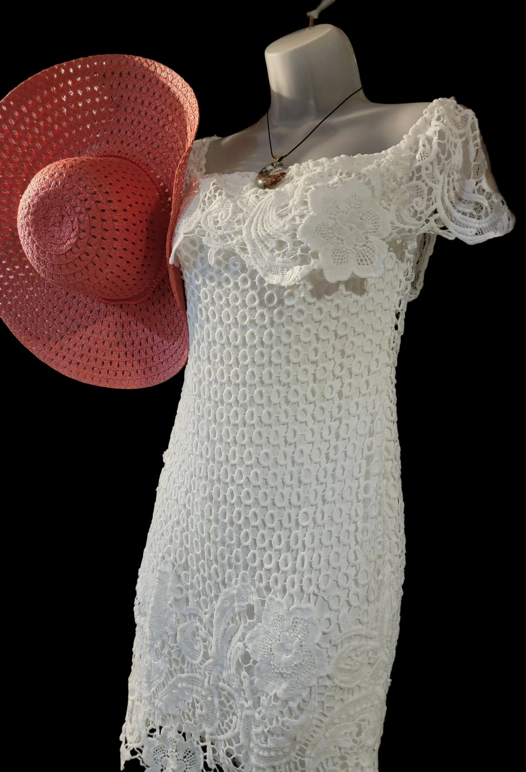 Medium white lace sundress, pink sunhat and a crescent moon necklace.